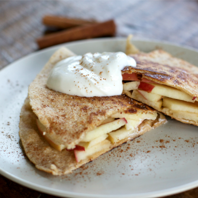 Apples sandwiched between two layers of lightly toasted tortillas coated in cinnamon sugar.