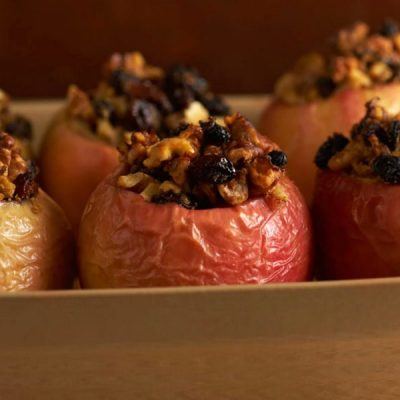 Cooked apples stuffed with nuts and raisins.