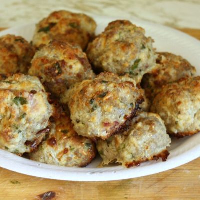 Plate of slightly browned meatballs.