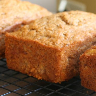 A loaf of slightly browned banana bread.