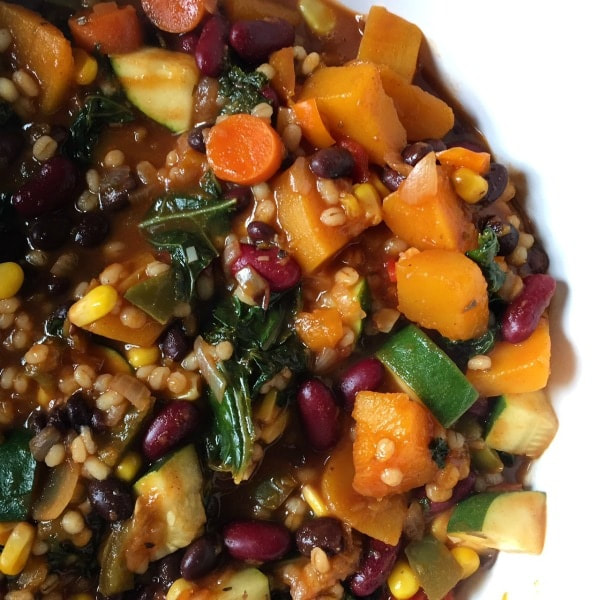 Beans, diced carrots, corn, and other vegetables mixed with barley.