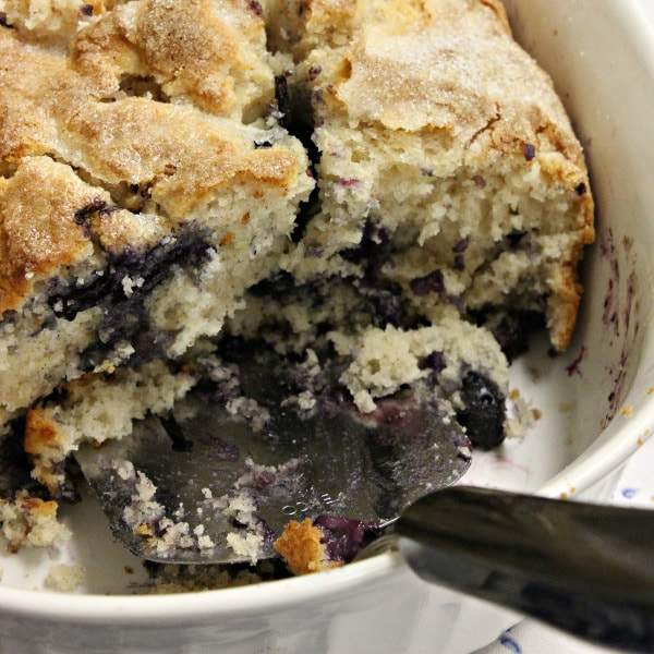 Sliced of moist blueberry coffee cake.