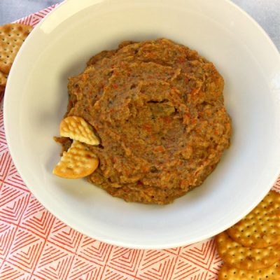 Bowl of blended eggplant, onion, and bell pepper dip