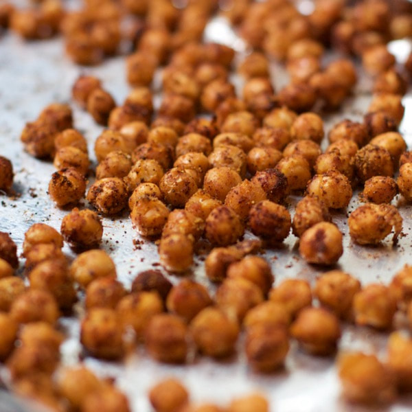 Crispy, roasted chickpeas on a sheet pan.