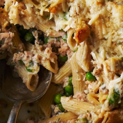 Cooked whole wheat pasta mixed with canned salmon, peas, green onions topped with Parmesan cheese.