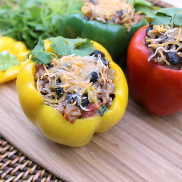 Baked, hollowed yellow pepper, filled with black beans, onion, brown rice, corn, and diced tomatoes topped with shredded cheese.